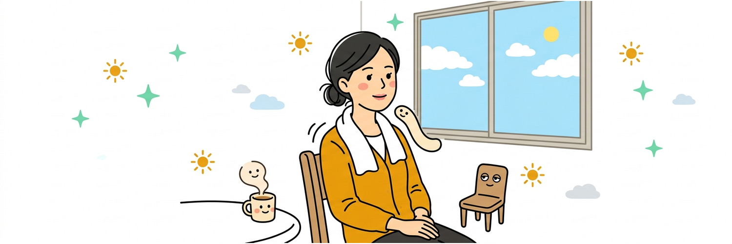 休憩室の椅子で肩甲骨を背もたれに預ける場面